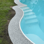 ©Terramore-Bodendesign_IMG_1277 Pool mit Steinteppich Umrandung